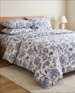 Bedeasia blue floral printed cotton king size bedsheet set on bed