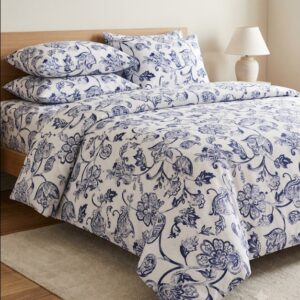 Bedeasia blue floral printed cotton king size bedsheet set on bed