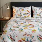 Cotton single bedsheet with colorful botanical print on a white base