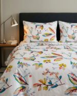 Cotton single bedsheet with colorful botanical print on a white base